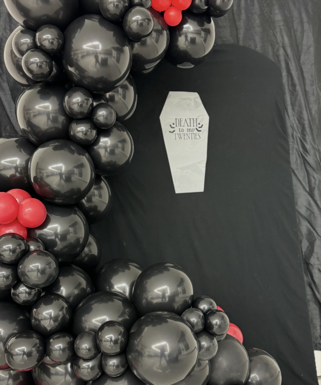 Black and silver balloon arch